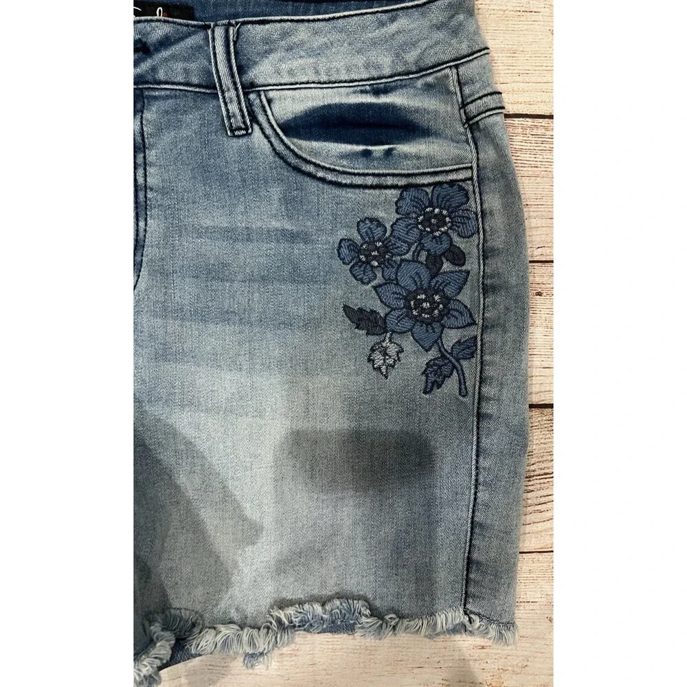 Earl Jean mid-rise denim shorts with blue floral embroidery and a frayed hem 12